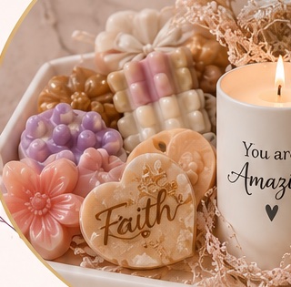 Selection of pastel handmade soaps in floral and heart shapes